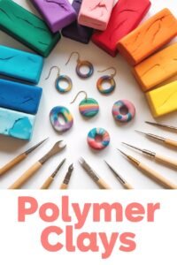 Colorful polymer clays, tools, and handmade earrings for crafting and design projects on a white background.