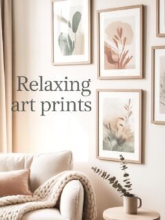Cozy living room with relaxing art prints, neutral tones, comfy sofa, and decorative greenery.