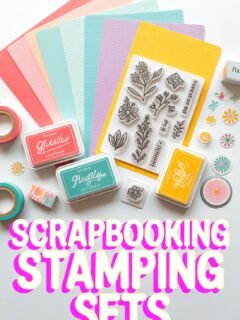 Colorful scrapbooking supplies, including stamping sets, ink pads, and paper, arranged creatively on a white background.